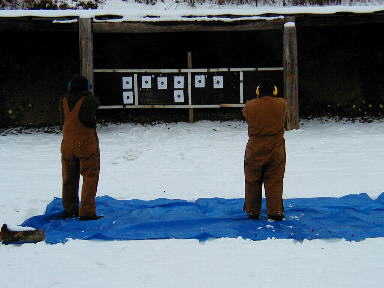 Using a tarp to collect brass.